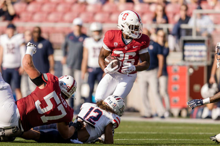 Sep 23, 2023; Stanford, California, USA; Stanford Cardinal running back Sedrick Irvin (26) runs the ball against the Arizona Wildcats during the first quarter at Stanford Stadium. Mandatory Credit: John Hefti-USA TODAY Sports